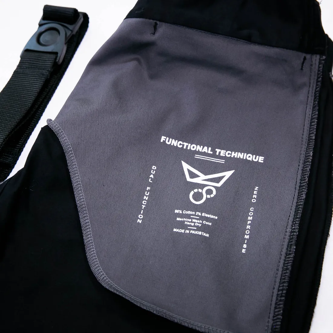 The printed label inside FNTQ gi pants: 98% cotton, 2% elastane, machine wash cold, hang dry