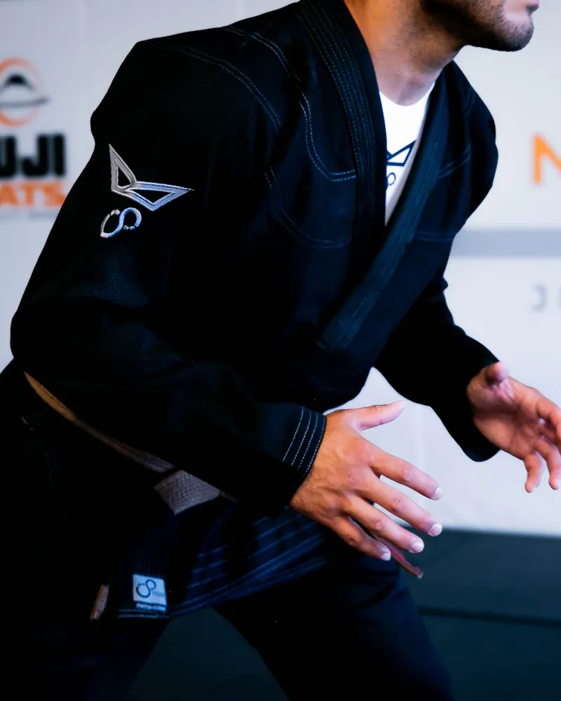 The black FNTQ gi, worn with a brown belt